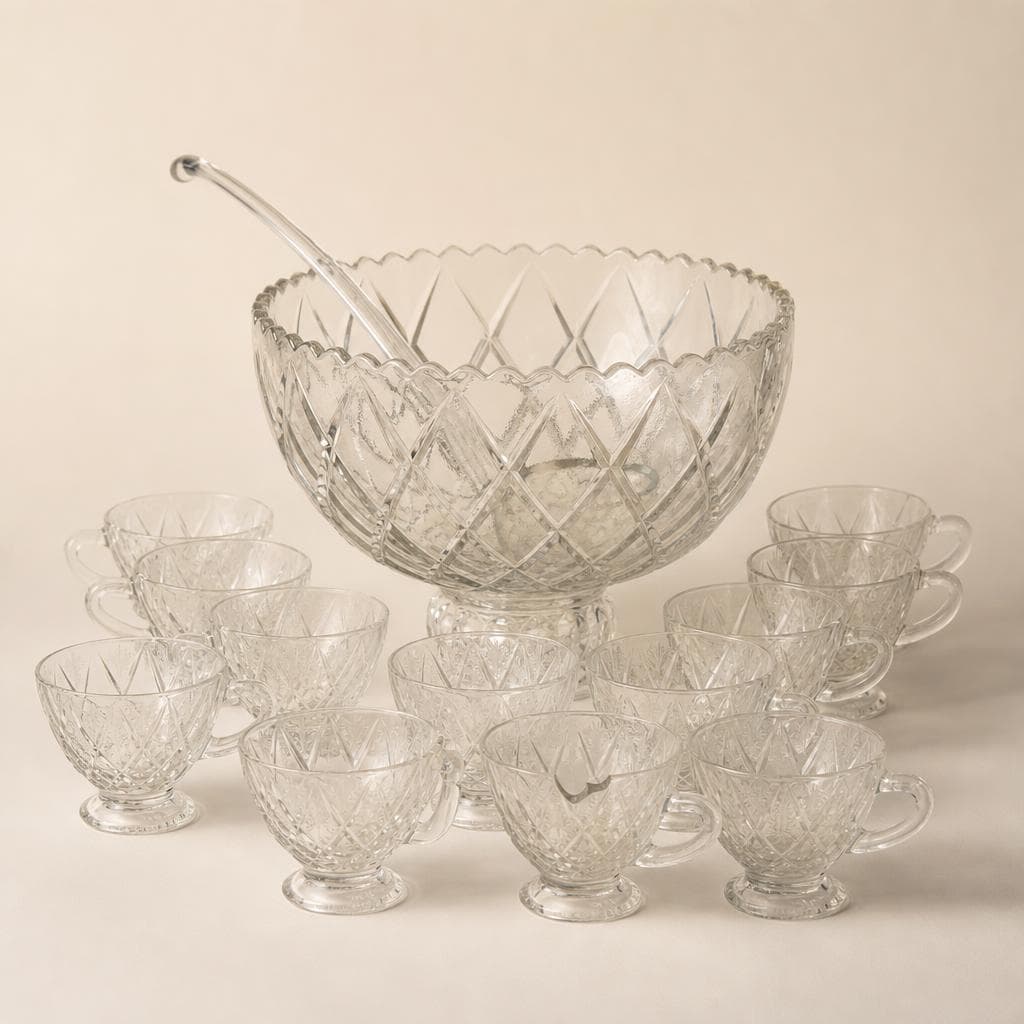 Cut glass punch bowl set with 12 cups